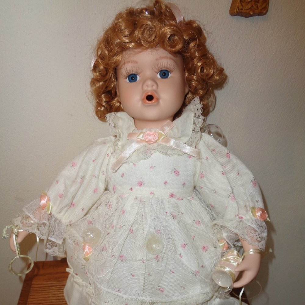 Blowing Bubbles Porcelain Doll with Wand & Bubbles and Seat To Sit On 15 Inch